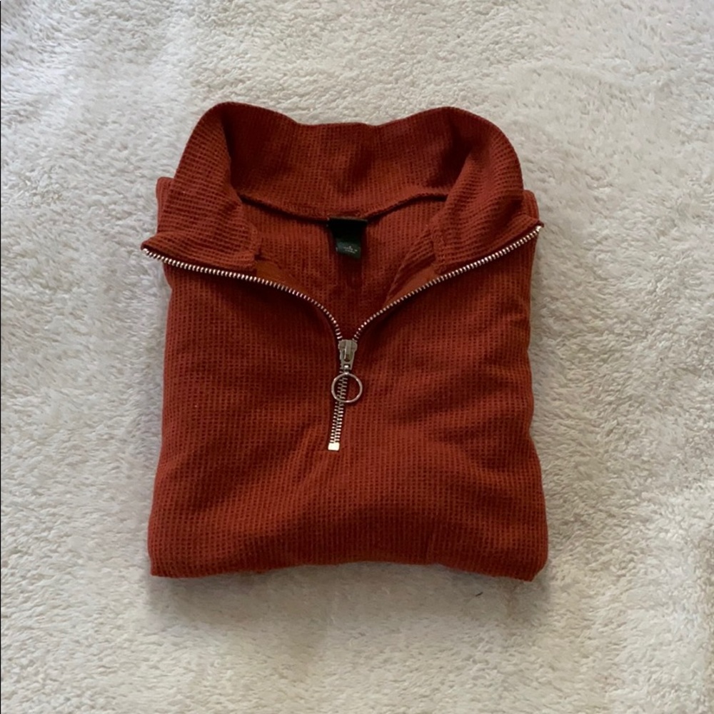 Longer sleeve polo shirt